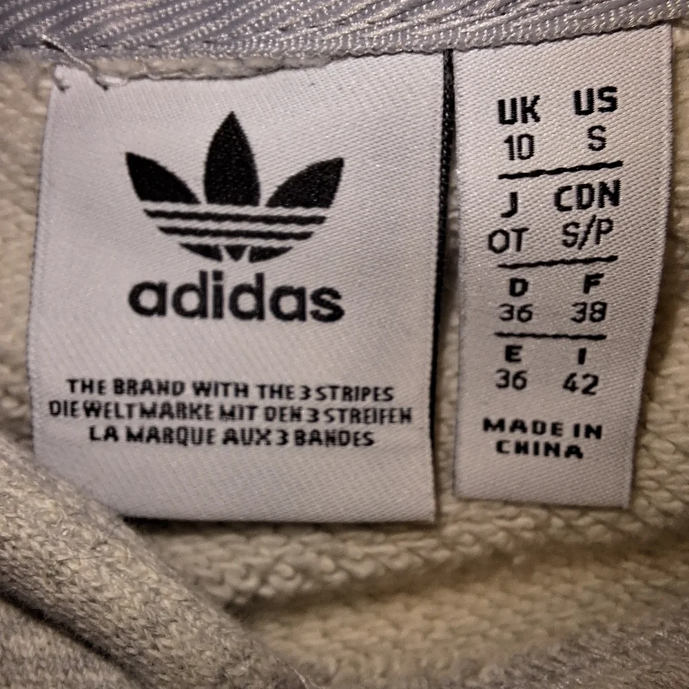 An Adidas hoodie in a mens size small. It's pre-loved and in great condition.